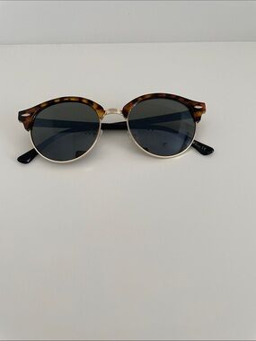 Tortoiseshell Round Sunglasses with Dark Lenses